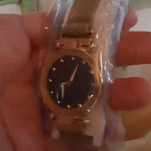 Brand new gold watch